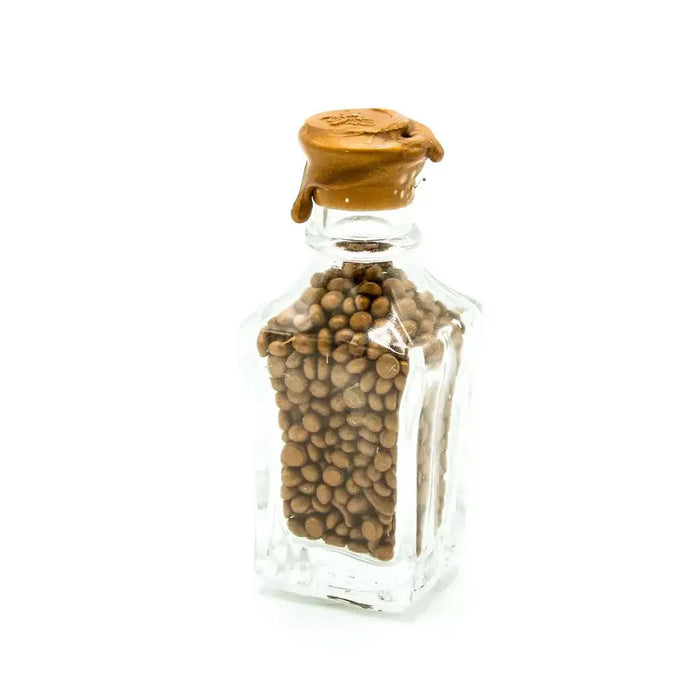 Bottle of Wax Beads, Copper