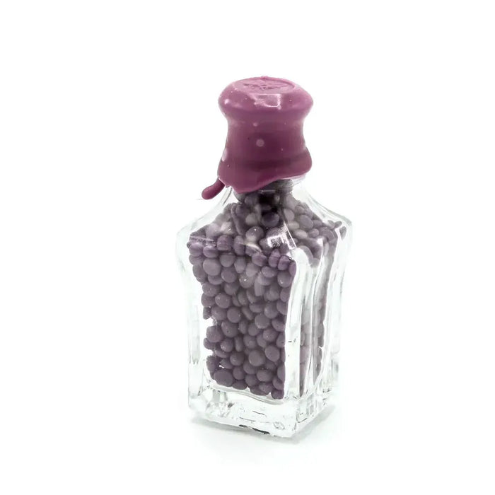 Bottle of Wax Beads, Purple