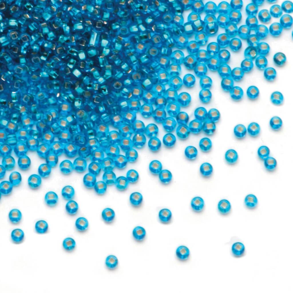 SEED BEAD SLVR LN LIGHT BLUE 24G 