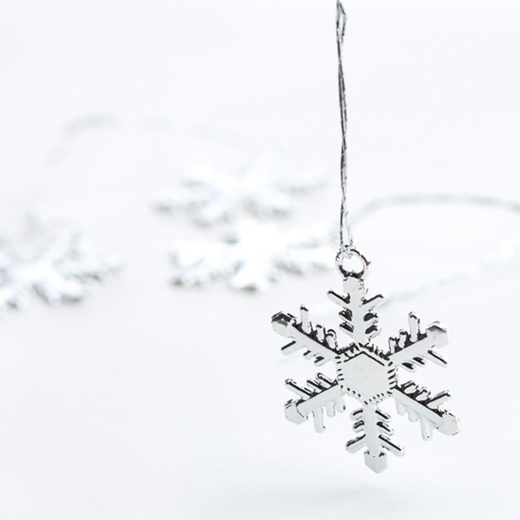 Mini Snowflake Ornaments Silver 1 inch 4 pack 