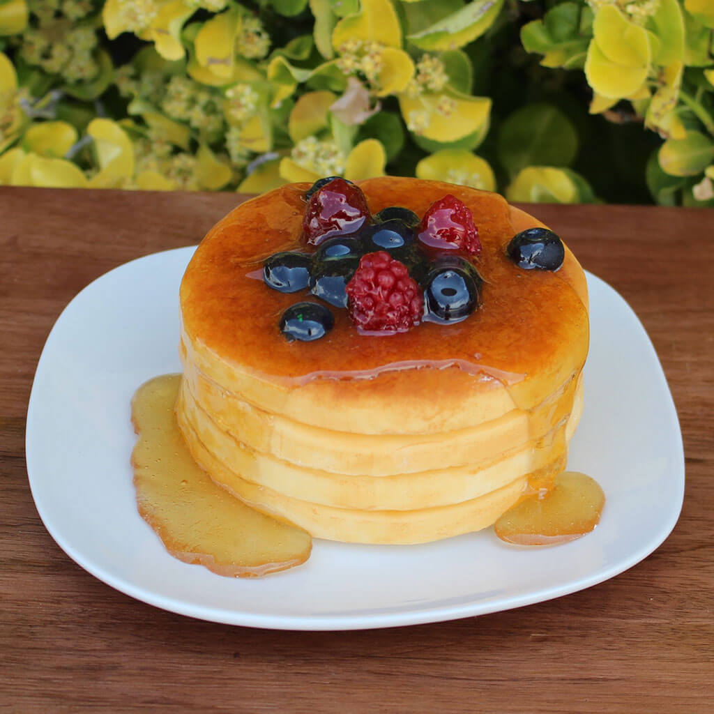 Small Plate Of Pancakes Topped W/Fruit